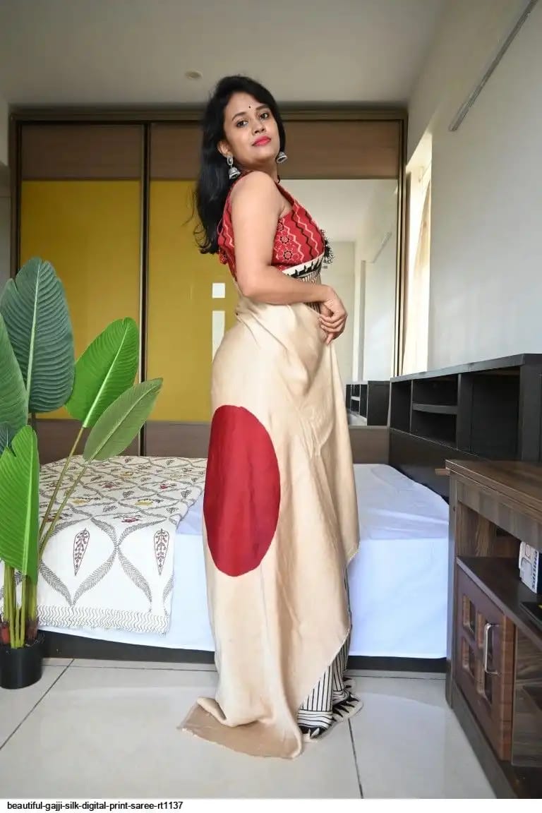 Full-length view of handcrafted Ajrakh saree with bindi design